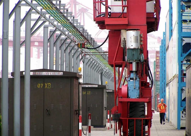 Container port RTG crane oil to electricity conversion and application